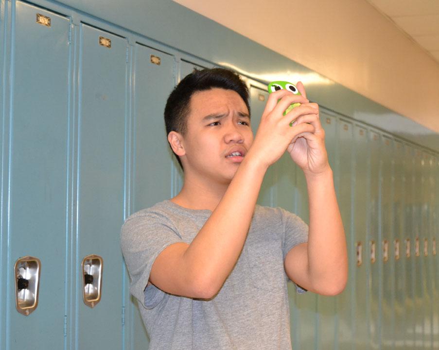 Senior Andrew Vu gets frustrated because he cannot get Wi-Fi.