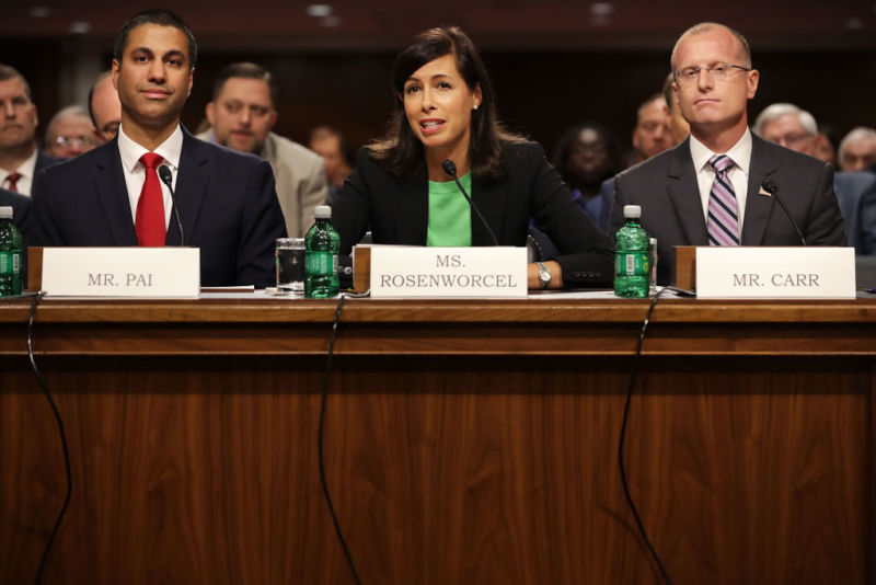 WASHINGTON, DC - JULY 19:  (L-R) Federal Communications Commission Chairman Ajit Pai and nominees Jessica Rosenworcel and Brendan Carr prepare to testify before the Senate Commerce, Science and Transportation Committee during their confirmation hearing in the Dirksen Senate Office Building on Capitol Hill July 19, 2017 in Washington, DC. Pai has served as the FCC chairman since January of 2017 and is due for re-appointment.  (Photo by Chip Somodevilla/Getty Images)