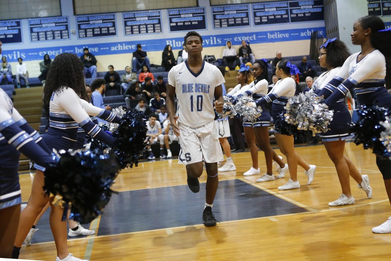 Senior guard Delaino Jessup gets ready for a match against Richard Montgomery.