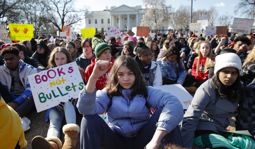 Students walked out of school to protest gun violence in response to the previous months shooting of 17 people at Floridas Marjory Stoneman Douglas High School. 