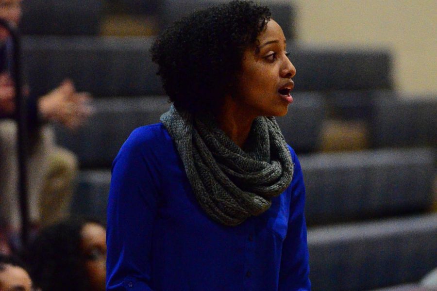 Tesfamikael is pictured as her JV Boys Basketball team faces Walt Whitman (2018). 