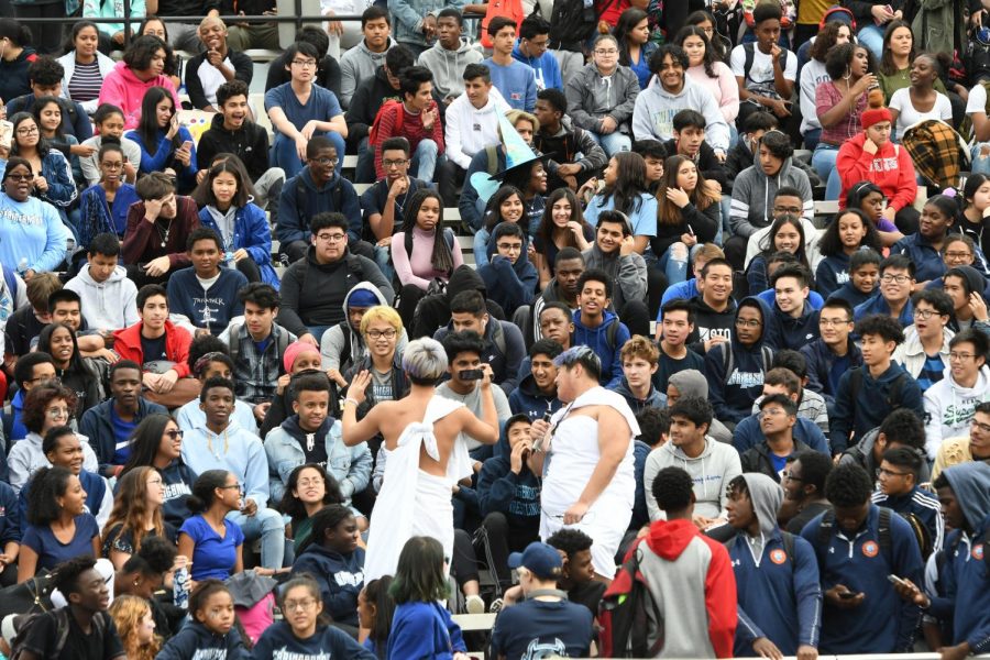 Students watch an October pep rally.